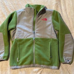 Green/gray North Face zip up jacket with pink lettering.